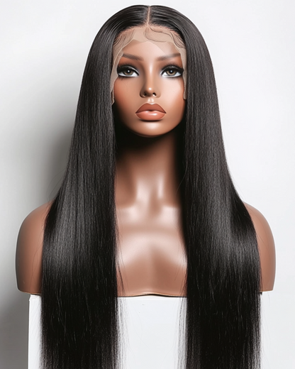 Mannequin head with long black straight wig on a white background